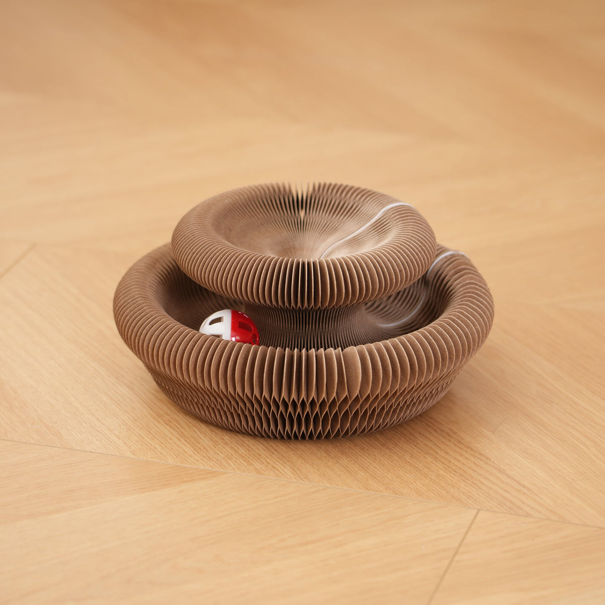 Magic Coil Katzenspielzeug aus Kraftpapier in mehreren Formen übereinander